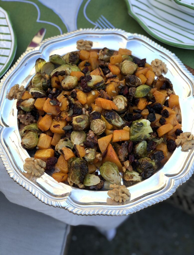 A Thanksgiving holiday must: delicious roast vegetable dish of brussels sprouts, cubed butternut squash, dried cranberries